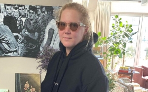 Amy Schumer Cracks Crude Joke While Waiting to Get Her COVID-19 Vaccine