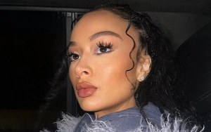 Draya Michele Shares Steamy Beach Photo Amid Rumors She's Pregnant With Jalen Green's Child