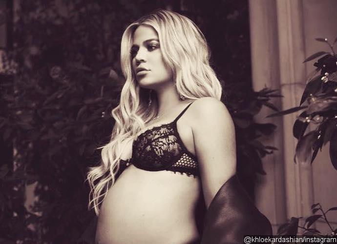 Khloe Kardashian Cradles Growing Baby Bump in Sexy Lingerie Snap