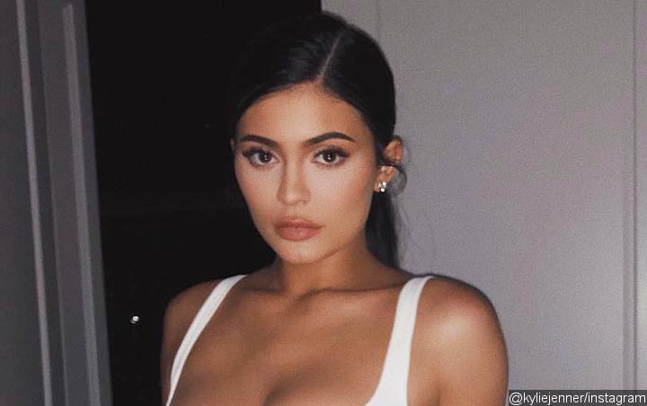 Kylie Jenner Flaunts Underboob in Latex Bra for New Kylie Cosmetics Launch