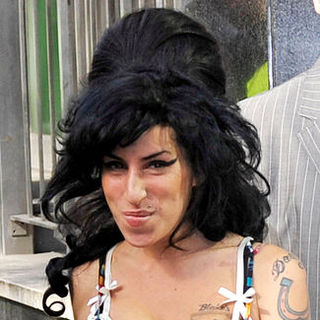 Amy Winehouse Arrives at the Westminister Magistrates Court in London on March 17, 2009