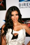 Kim Kardashian Apologizes for Flipping Off Paps, Promises to Be Polite