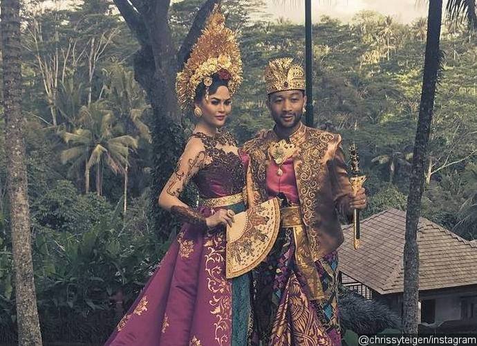 Chrissy Teigen and John Legend Wear Traditional Outfit During Vacation in Bali