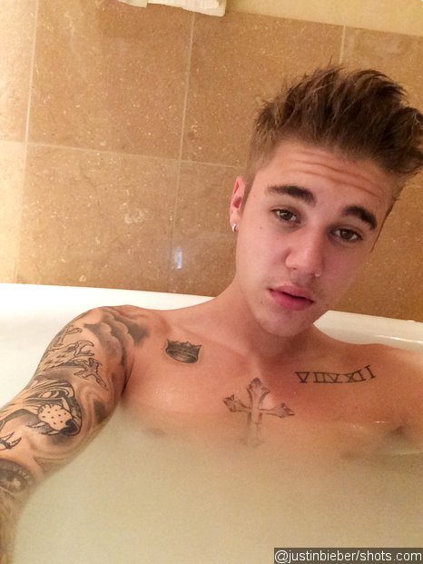 Justin Bieber Takes Selfie While Curing His Hangover In Tub ~ Fradoh Music 