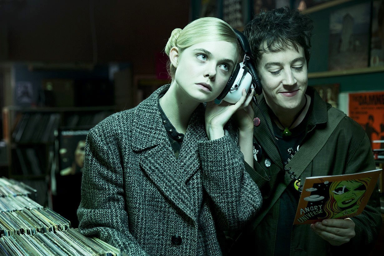 Elle Fanning stars as Zan and Alex Sharp stars as Enn in A24's How to Talk to Girls at Parties (2018)