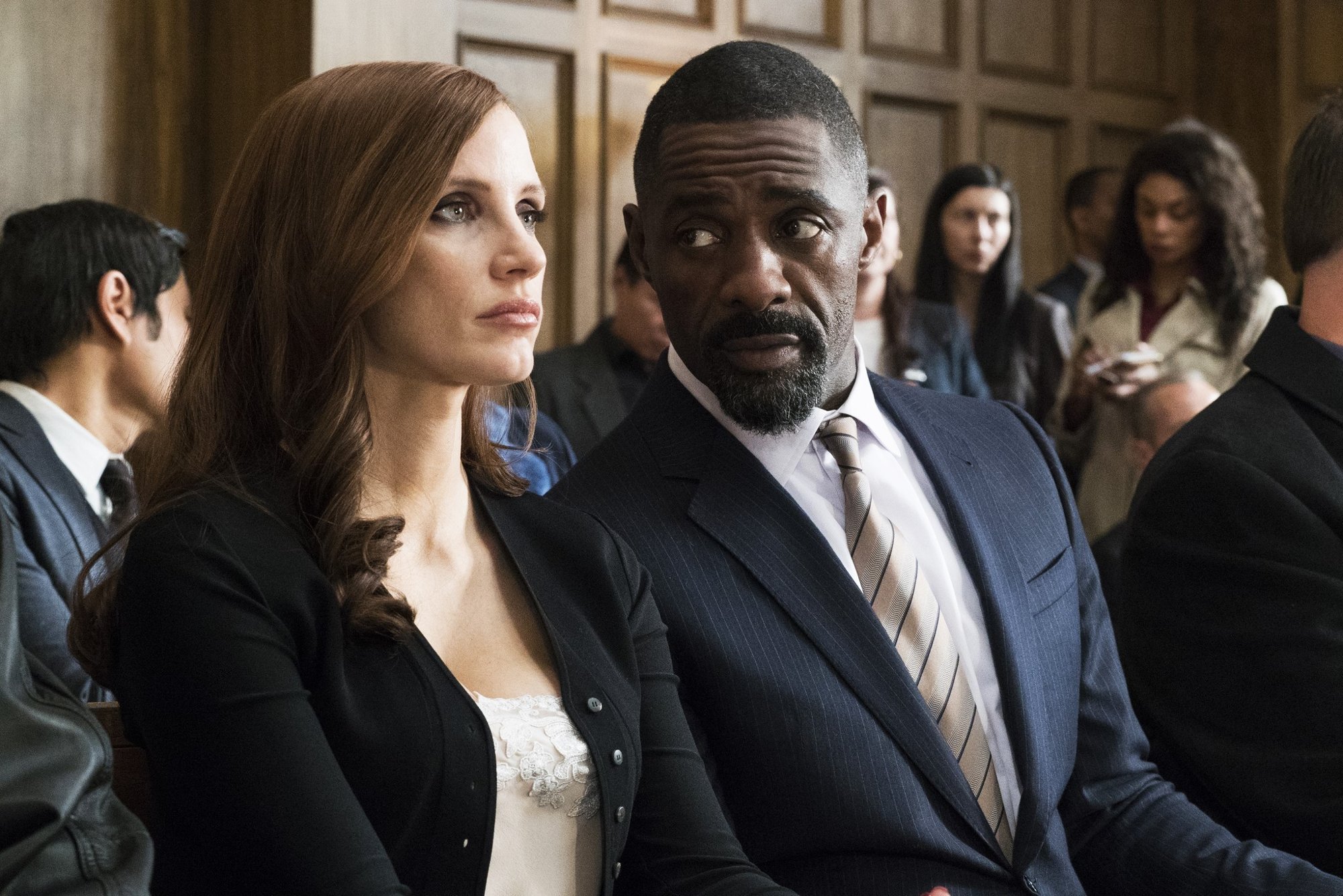 Jessica Chastain (Molly Bloom) and Idris Elba in STX Entertainment's Molly's Game (2017)