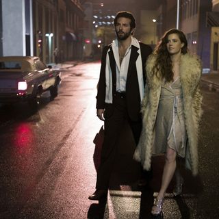 Bradley Cooper stars as Richie DiMaso and Amy Adams stars as Sydney Prosser in Columbia Pictures' American Hustle (2013)