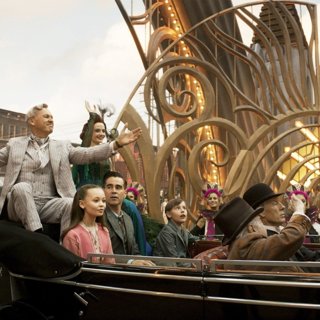 Michael Keaton, Eva Green, Nico Parker, Colin Farrell and Finley Hobbins in Walt Disney Pictures' Dumbo (2019)