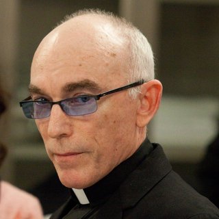 Jackie Earle Haley stars as Father Oscar Huber in Exclusive Releasing's Parkland (2013)