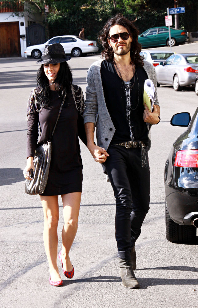 Katy Perry and Russell Brand holding hands while walking on Sunset Blvd