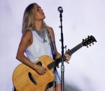 Carrie Underwood Addresses On-Stage Nasty Fall After Performing in the Pouring Rain