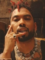 Miguel Performs Gruesome Body Suspension Show With Hooks In His