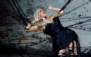 Cardi B Tangled in Web of Phone Cords in Futuristic 'Ring' Music Video Ft. Kehlani