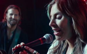 Reluctant Lady GaGa Joins Bradley Cooper On Stage in 'Shallow' Music Video