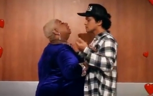 Bruno Mars Gets It On With Superfan in Playful Backstage Video