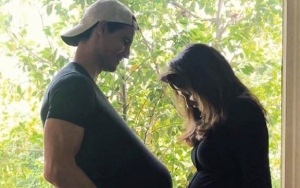 Robbie Amell Flaunts Faux Baby Bump to Announce Wife's Pregnancy