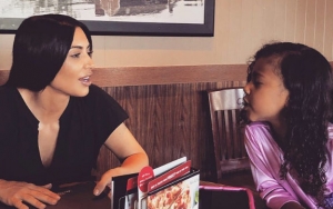 Kim Kardashian Says She Delayed Giving Birth to North West for a Manicure