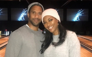Report: 'RHOA' Star Kenya Moore 'Contemplating Reconciling' With Husband Marc Daly