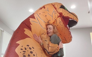 Joey King Dons Dinosaur Costume to Safely Hug Grandma on Her Birthday Amid Pandemic
