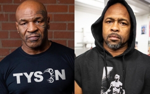 Mike Tyson Gets Yelled at by Crazy Fan After Drawn Match Against Roy Jones Jr.