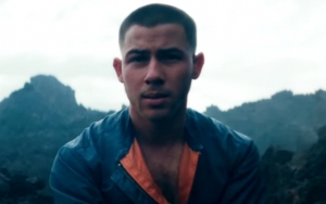 Nick Jonas Stuck in Distant Planet in 'Spaceman' Music Video