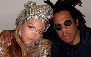 Beyonce Looks Stunning in Gold Chain-Embellished White Plunging Suit For Date With Jay-Z