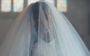 Lil Nas X's 'THATS WHAT I WANT' Music Video Shows Him Crying in Wedding Dress in Church