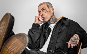 Travis Barker Blasts Troll Criticizing His 'Ridiculous' Tattoos 