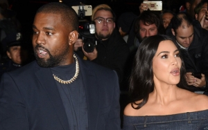 Kim Kardashian Dubs Kanye West's Fans 'Fickle' for Criticizing Her Post-Split 'Flame Outfit'