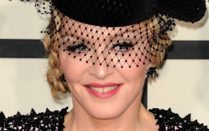 Madonna Flashes Nipple in Risque Video After Begging Trolls to 'Stop Bullying' Her