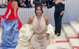 Kim Kardashian Is Draped in Pearls, Brings Daughter North West to Met Gala