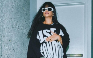 Pregnant Rihanna Advocates Use of Condom With Cheeky T-Shirt