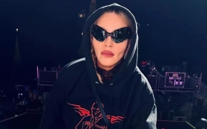 Madonna Gives Middle Finger While Wearing Pope Hoodie 