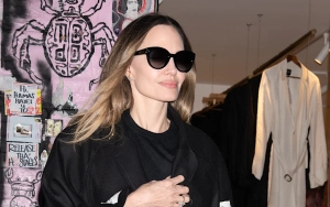 Angelina Jolie Debuts New Hair in Rare Public Sighting With Son Pax