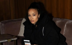 Draya Michele Trolled After Sharing Pic of Stranger Holding Her Hand Amid Flight Anxiety