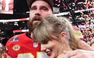 Taylor Swift and Travis Kelce Pack on PDA After His Surprise Onstage Appearance at 'Eras Tour' Show