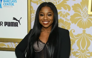 Reginae Carter Clarifies Relationship Status After Holding Hands With Mystery Man