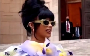 Cardi B Continues to Hide Midriff While Wearing Sky-High Boots Amid Pregnancy Rumor