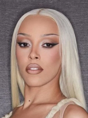 Doja Cat Cracks Fans Up After Arriving at 2024 Met Gala in Nothing But a Towel