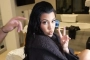 Kourtney Kardashian Shares Photo of Her in Mom Duty While Wearing Sizzling Outfit