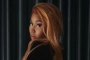 Nicki Minaj Taken Aback by Fan's Unexpected Voice After Handing in Her Microphone