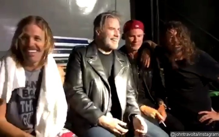 John Travolta Joins Foo Fighters Onstage at New York Gig