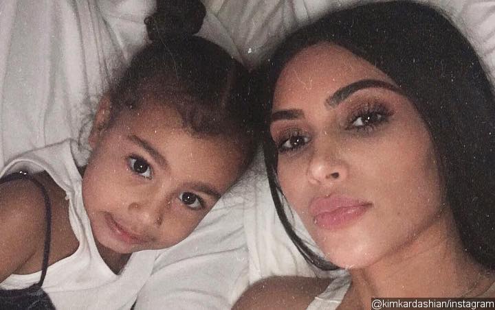 Kim Kardashian Hits Back at Critics Who Slam Her for Straightening Daughter North's Hair