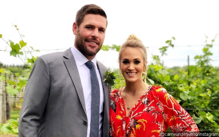  Report: Carrie Underwood Expecting Twin Daughters With Mike Fisher