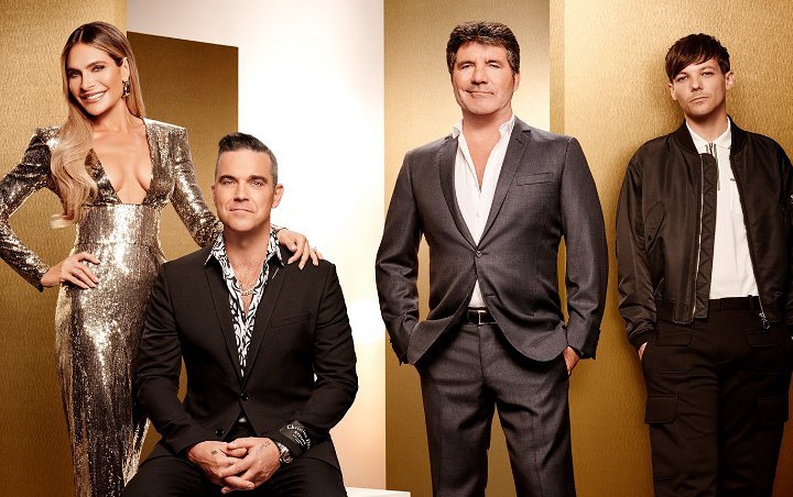 Simon Cowell Gushes Over 'X Factor' Judge Robbie Williams