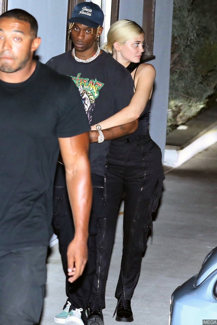 Kylie Jenner and Travis Scott pack on PDA.