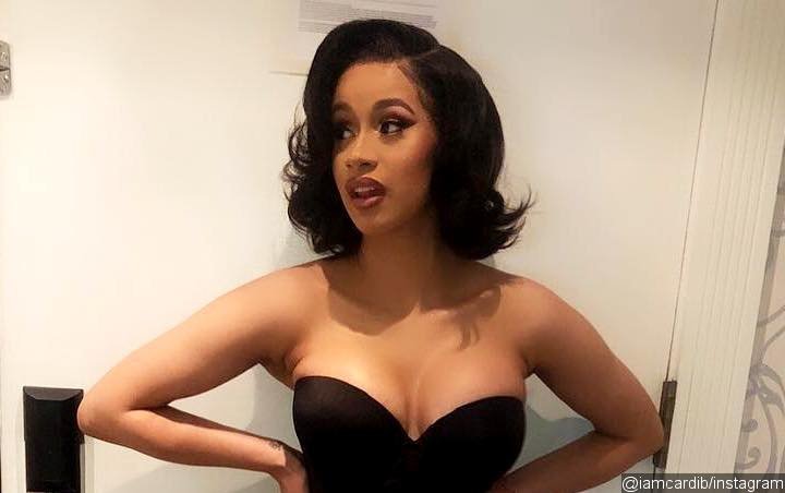 Cardi B Steps Out in Bathrobe After Ranting About Her Sagging Breasts