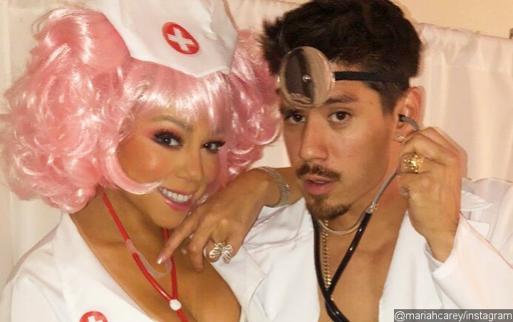 Mariah Carey Snuggles Up to BF Bryan Tanaka in Sexy Nurse Halloween Outfit