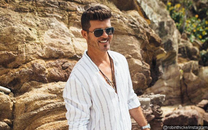 Robin Thicke Mulls Over Malibu Home Burned Down by California Wildfires