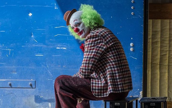 Who Dies? Joaquin Phoenix Is Untypical Mourner in New 'Joker' Set Photos